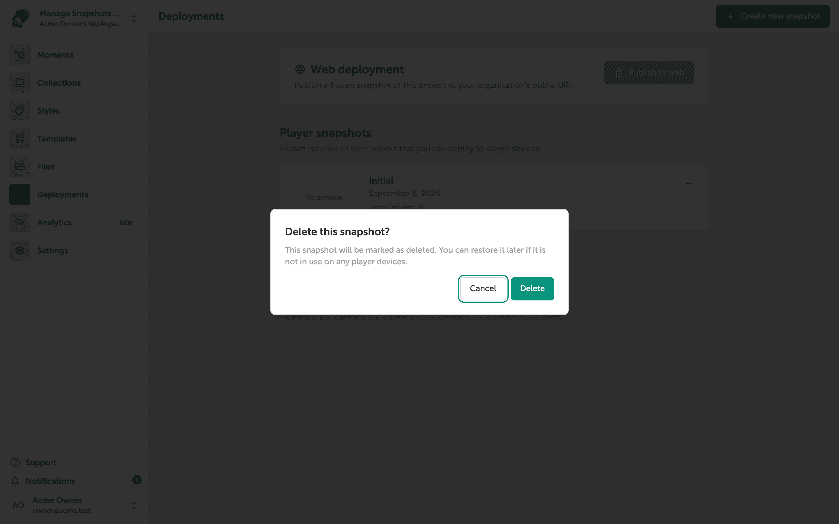 A confirmation dialog asking 'Delete this snapshot?' with Cancel and Delete buttons, overlaid on the Deployments screen