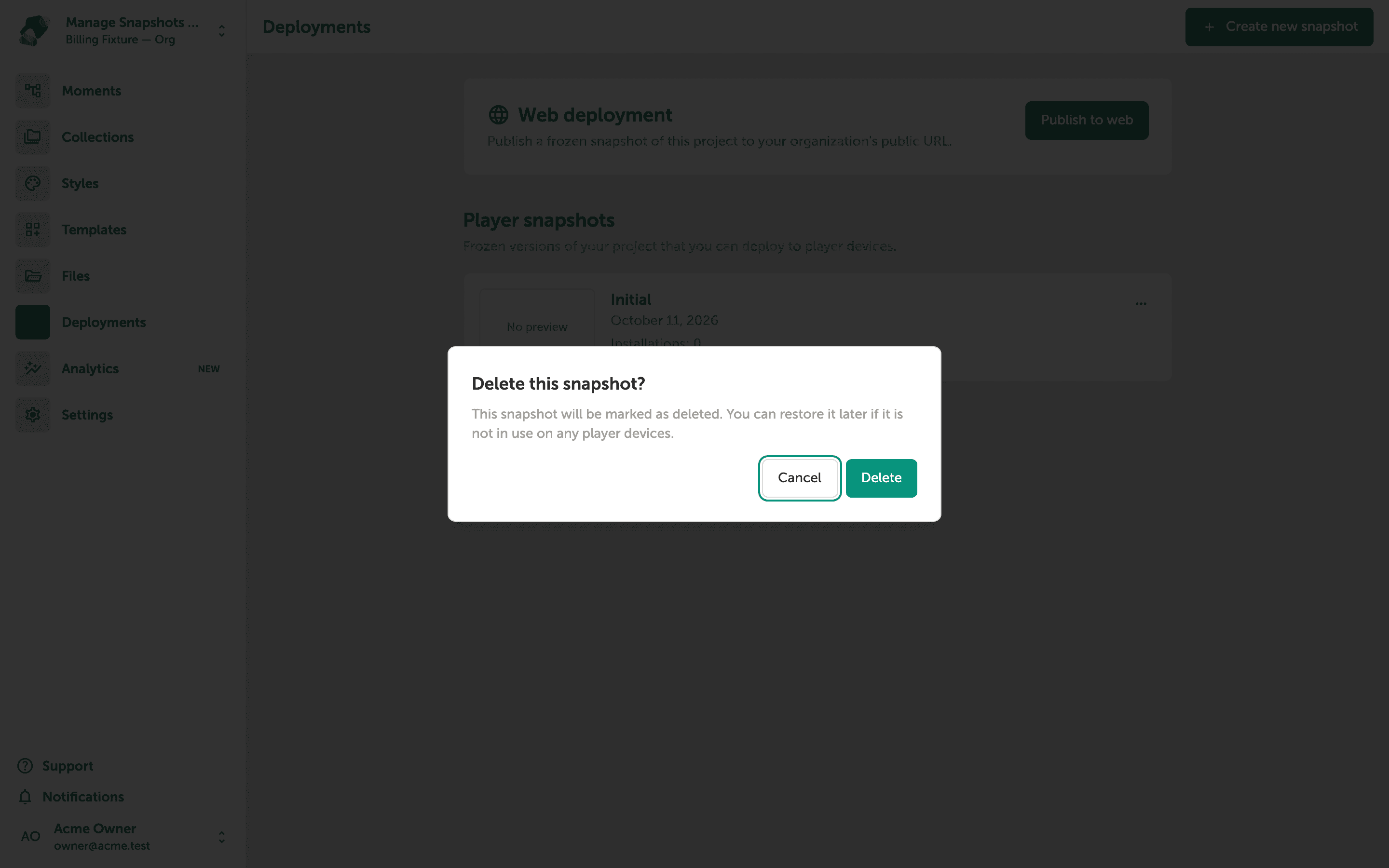 A confirmation dialog asking 'Delete this snapshot?' with Cancel and Delete buttons, overlaid on the Deployments screen