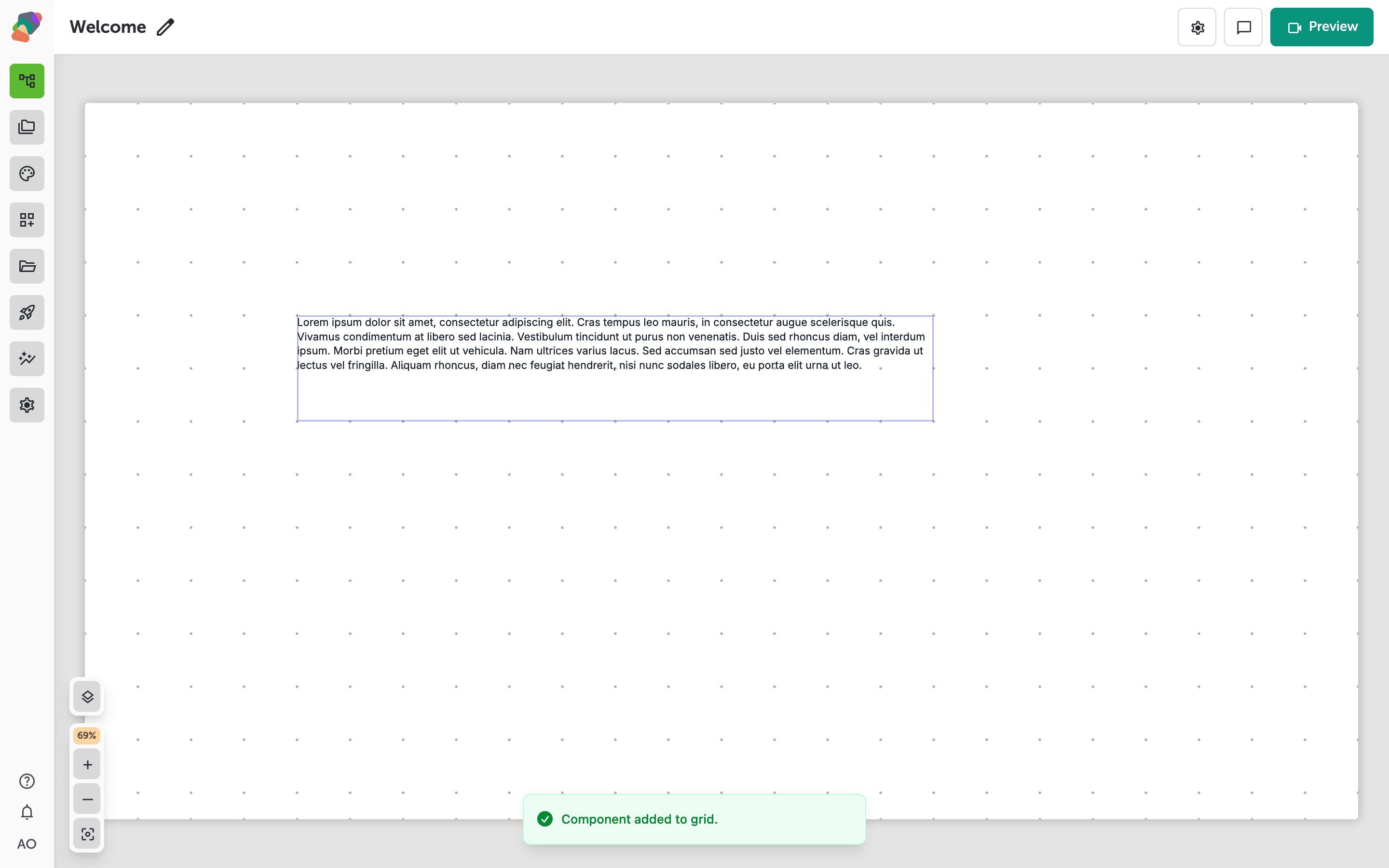 The view editor canvas with a Text component placed on the grid, showing the blue selection border and resize handles