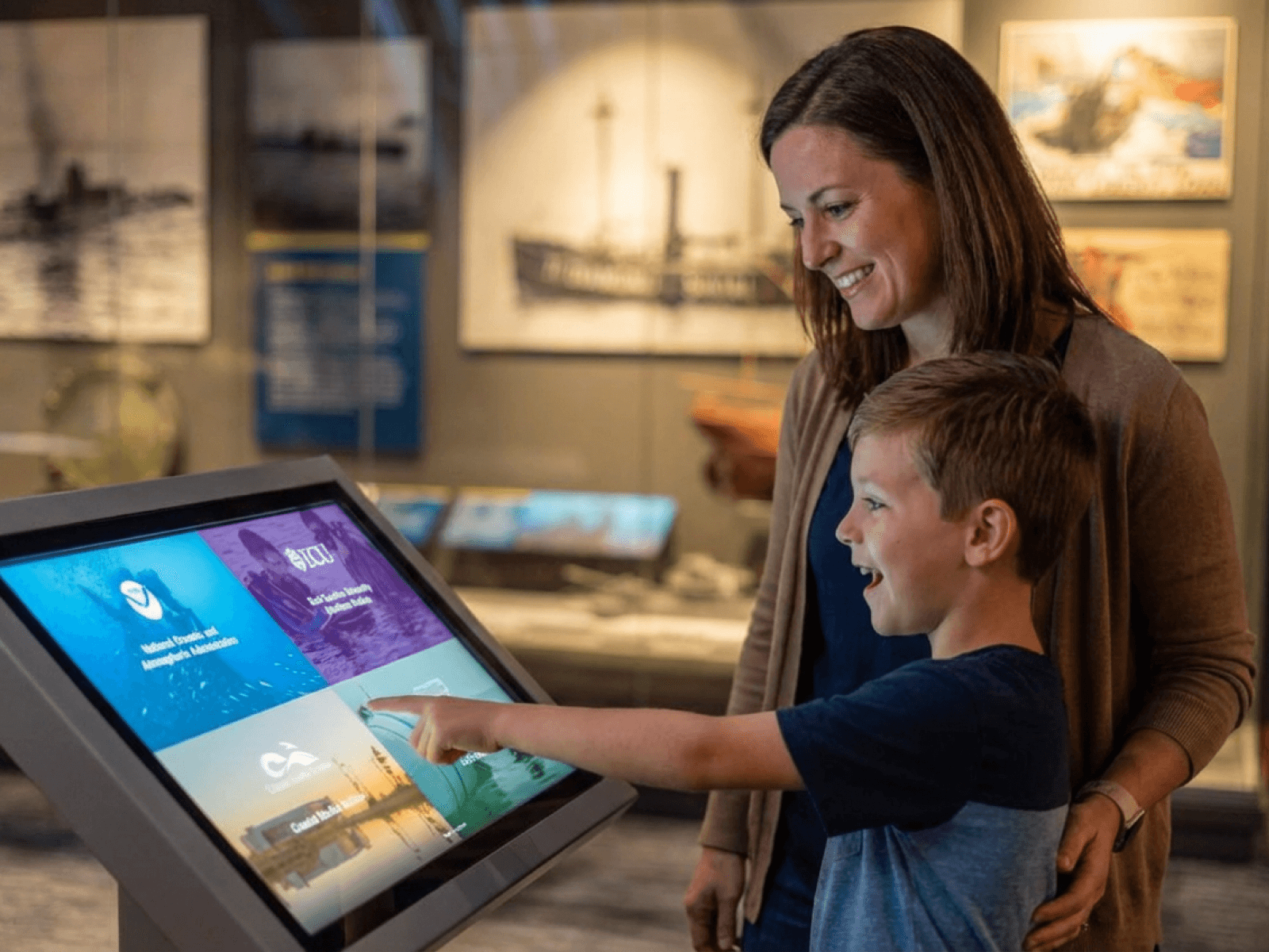 Cabinet of curiosities exhibit on a large interactive display